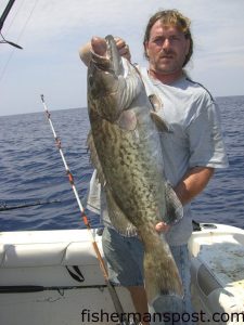 Kenny Tew with a 35 lb. gag grouper caught 58 miles off Wrightsville Beach on a cut bait. He was fishing with J.R. Melvin aboard the "FishZilla."