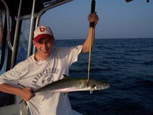 Justin Stinnett, a Marine from OH, with a king mackerel he caught while fishing with Capt. Jim Sabella of Plan 9 Fishing Charters. The king fell for a dead cigar minnow on a Pirate Plug while trolling at AR 362.