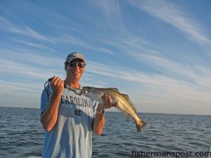 Frank Arey, of Charlotte, with a 4 lb. speckled trout caught near Bald Head Island on a live peanut pogy. He was fishing with his son, Frank Arey, Jr.