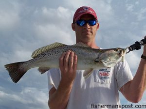 D.F. Bunting with an 8 lb. speckled trout that fell for a Gulp shrimp beneath a popping cork in the Neuse River. He was fishing with Capt. Rennie Clark of Tournament Trail Charters.