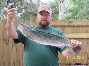 Mike Martin, of Oak Island, with a 6 lb., 7 oz. speckled trout caught on a Gulp bait in the ICW near Oak Island while fishing with Capt. Vanessa Martin of Nauti-Girl Charters.