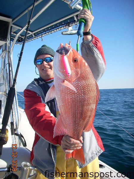 Taylor Perdue with a red snapper he hooked on a jig tipped with cut bait in 110’ of water. He was fishing 42 miles off New River Inlet aboard the “Reel Return” with Tanner Gray.