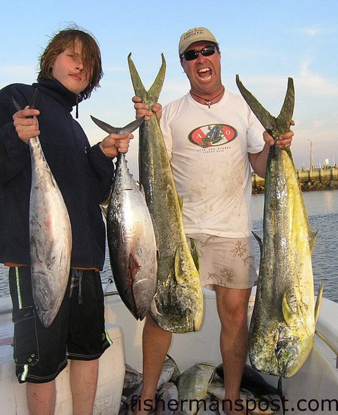 Mikie Perry and Randy Smith, from High Point, NC, with false albacore and a big doplhin (part of a catch of dolphin, blackfin, kings, and albies) they hooked while trolling ballyhoo under Blue Water Candy lures near the Steeples.