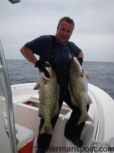 Ryan Young, from Wilmington, with 20 and 16 lb. gag grouper caught on whole squid. He was fishing 35 miles southeast of Masonboro Inlet in 100' of water on the "Johnboat."