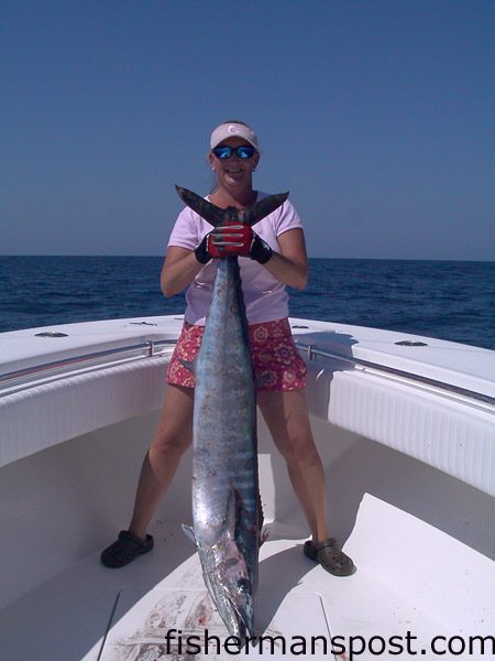 Jodi Chilcote with a 44 lb. wahoo she hooked while trolling the Gulf Stream off Carolina Beach. Weighed in at Island Tackle and Hardware.