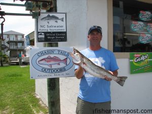 Joe Kreuser, of Morehead City, with a 6 lb. speckled trout he hooked on the backside of the Haystacks on a live mud minnow. Weighed in at Chasin Tails Outdoors.