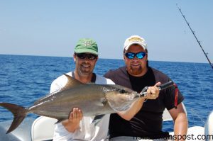 Gary Hurley and Capt. Chesson O'Briant with an almaco jack that fell for a Diawa Sacirfice Lightning jig above AR 302.