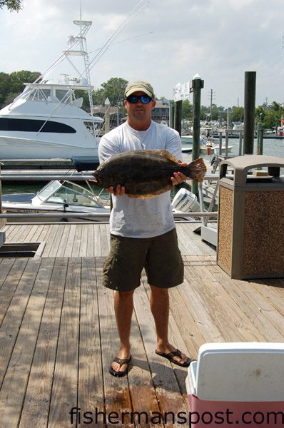 Dennis Durham, from Wilmington, with the 5.47 lb. flounder that earned him first place and $2,345 in the Fisherman’s Post Spring Inshore Challenge. Durham hooked the valuable flatfish on a Carolina-rigged pogy in the Cape Fear River.