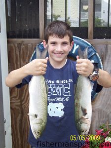 Charlie, from Hampstead with a pair of bluefish he hooked from Surf City Pier.