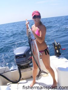 Christina Vaughan with her first king. The fish fell for a cigar minnow on a Hank Brown rig just outside Rich's Inlet while she was fishing with her father, Gery Vaughan of Hunter's Haven Taxidermy.