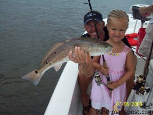 Hannah Carter with an over-slot red drum she hooked on a Carolina rig while fishing the Swansboro backwaters with Capt. Jeff Cronk of FishN4Life Charters.