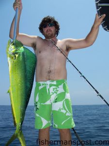 Brandon Wiggins, from Wrightsville Beach, with a gaffer dolphin that ate a cigar minnow on a green-skirted Hank Brown rig. He hooked the fish at the Schoolhouse while fishing with Brian Bowman.