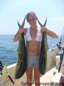 Lahana Tucker with a pair of dolphin (her first) she hooked at the 10 Mile Boxcars while trolling with her brother Joe Manor. The 'phins fell for frozen cigar minnows on Hank Brown Rigs.