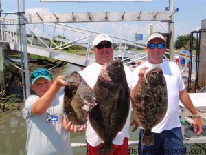 Austin Aycock with a doormat flounder that fell victim to a barracuda, Brian Aycock with a 9.2 lb. flounder, and Brandon Sauls with a 4.7 lb. flounder. The trio hooked their fish on live pogies at some structure 3-4 miles of Ocean Isle while fishing on the "Bone Crusher."