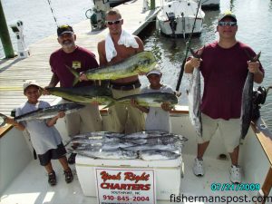 Pat, Ben, and Hayden Kee and Jim and Kyle Parrish with a trio of dolphin and 11 king mackerel they caught while fishing near the Horseshoe with Capts. Butch and Chris Foster on the "Yeah Right II" out of Southport.