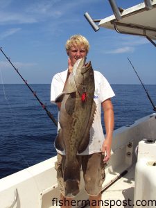 Taylor Barefoot, of Wilmington, with a healthy gag grouper he hooked on a Decoy Jig with a live cigar minnow.