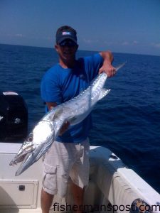 Kerry Gibson, of Jacksonville, with a barracuda that fell for a live mullet 10 miles off New River Inlet while he was fishing on the "Reel MCS."