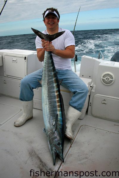 Tanner Gray, of North Topsail Beach, with a citation wahoo that fell for a purple/black Blue Water Candy Jag in 250′ of water 67 miles offshore while trolling the Gulf Stream with Taylor Perdue and Scott Erickson.