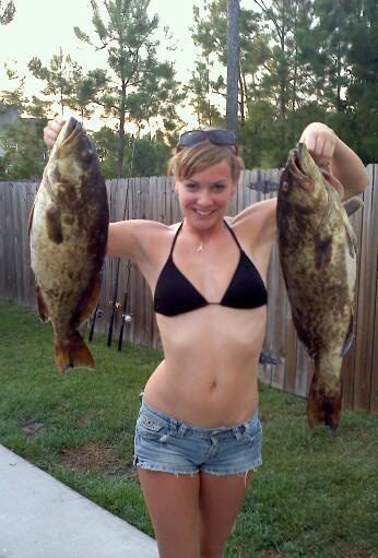 Becky Flatley, of Huntingtown, MD, with a pair of gag grouper that bit northern mackerel at a ledge 18 miles off Rich’s Inlet while she was fishing with her boyfriend, Jason Alberti, and family.