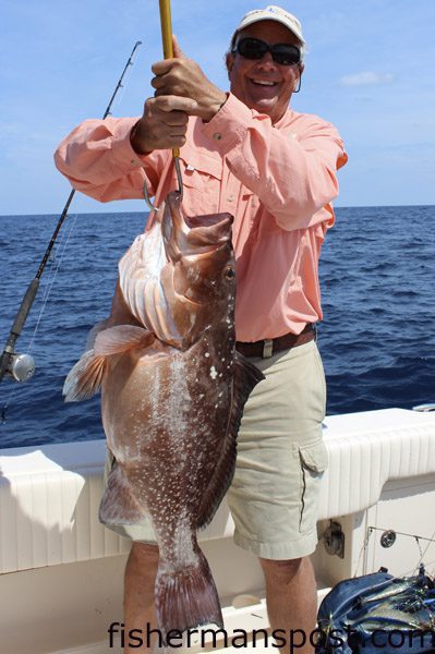 Buzz Parker, of Pinehurst, NC, with a 24 lb. red grouper that bit a squid/cigar minnow combo in 120′ off Wrightsville Beach while he was fishing with Capt. Arlen Ash of Ultimate Reaction Charters.