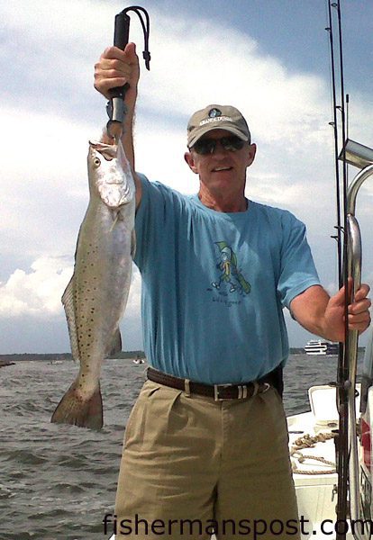 Davis Wright with a 4+ lb. speckled trout that bit a float-rigged live shrimp at the Little River jetty while he was fishing with Capt. Mark Stacy of OceanIsleFishingCharters.com.