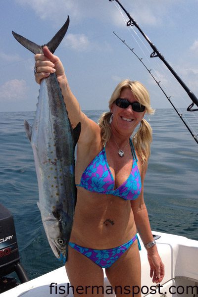 Terri Johnson with an 8 lb. spanish mackerel that bit a cigar minnow at Lighthouse Rocks while she was fishing with her boyfriend David Kesler.