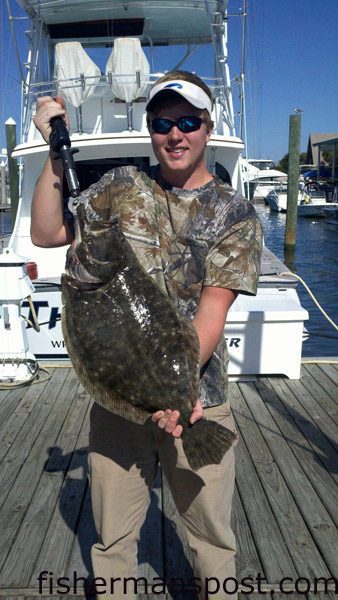 Chase Williams, of Wilmington, with a 9.55 lb. flounder that bit a live finger mullet in Masonboro Inlet.