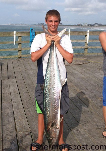 Zack McDermon with a 37 lb. king mackerel that bit a live bait on a king rig off the end of Seaview Pier.