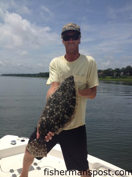 Doug Carroll with a 5 lb., 8 oz. flounder that bit a white Gulp shrimp near Masons Inlet.