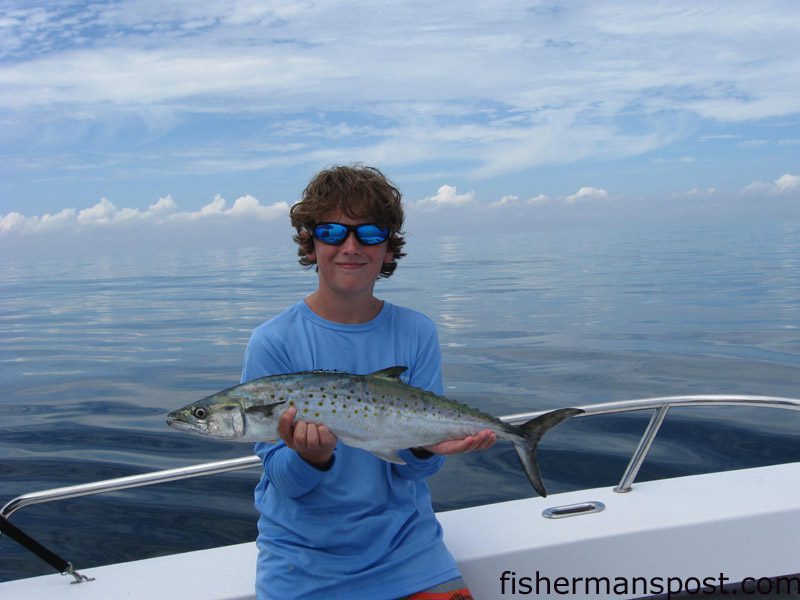 Bennett Brantley with a stout spanish mackerel that bit a skirted cigar minnow in 60′ of water off Wrightsville Beach while he was trolling with his father.