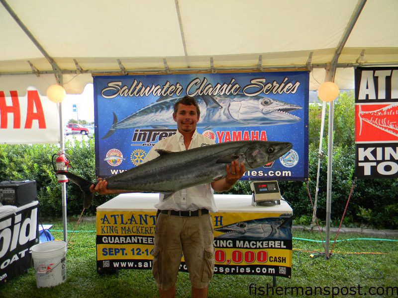 David Logan, of Wrightsville Beach’s “Logan’s Run” fishing team, with the 41.87 lb. king mackerel that earned he and D. Logan first place and over $31,000 in the Atlantic Beach Saltwater Classic. Their sole king of the day, the fish fell for a naked menhaden on top east of Cape Lookout Shoals.