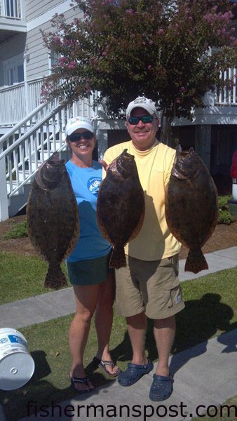 Shelly and Mike Kress, of Boiling Spring Lakes, NC, with 7.2, 4.8, and 6.2 lb. flounders (three of 11 keepers caught) they hooked on live mullet near Southport while fishing with Dennis and Laurie Watson. Weighed in at The Tackle Box.