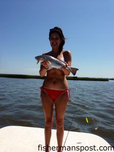 Madelyn Shore with a red drum she hooked in the Haystacks on a Gulp Mantis Shrimp while fishing with Capt. Patrick Shore.