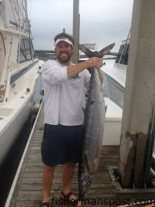 Hanes Hoffman with a wahoo that struck a ballyhoo while he was trolling the Gulf Stream off Wrightsville Beach with Capt. Ken Upton and mate Ken Cofer on the "Gamekeeper."