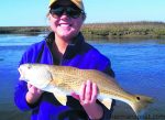 Taylor, from Wilmington, with a slot red drum that bit a mudm minnow on a Carolina rig in a lower Cape Fear River marsh. She was fishing with Capt. Robert Schoonmaker of Carolina Explorer Charters.