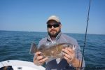 Keith Harabin, of Winnabow, NC, with a tautog that bit a shrimp-tipped Roscoe jig at the Liberty Ship off Wrightsville Beach.