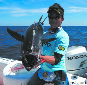 Boyang Zhang with a 33 lb. blackfin tuna that attacked a topwater popper in the Gulf Stream off Wrightsville Beach while he was fishing with Capt. Rick Croson of Living Waters Guide Service.