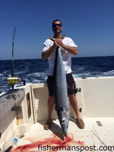 Steve Haynes, of Wilmington, with a 50 lb. wahoo that attacked a trolled ballyhoo in the Gulf Stream off Wrightsville Beach while he was fishing on the "Salty Seaman."