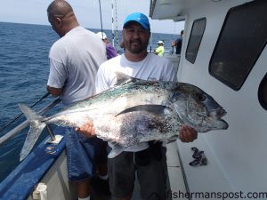 Toby Grantham, of Knightdale, NC, with a pending state record 46 lb. African pompano that bit a vertical jig offshore of Beaufort Inlet while he was fishing with Capt. Dave Tilley on the headboat "Continental Shelf."