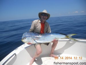 Harry Fisler with a 40 lb. dolphin that bit a ballyhoo under a red/black Blue Water Candy Mini Jag near the Swansboro Hole while he was fishing with David Cavanaugh.