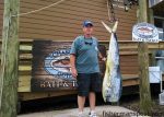 Leroy Everhard, from Kernersville, NC, with a 57 lb. dolphin that he hooked while trolling near the Big Rock. Weighed in at Chasin' Tails Outdoors.