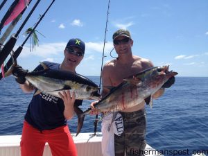 Tom and Justin Staab with blackfin tuna that bit topwater poppers in the Gulf Stream off Wrightsville Beach while they were fishing with Capt. Rick Croson of Living Waters Guide Service.