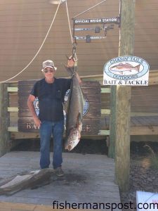 Edward Minshew with the 80 lb. cobia that took first place in the 3rd Annual Chasin' Tails Cobia Challenge, held April 19-June 15 out of Atlantic Beach's Chasin' Tails Outdoors. The fish earned him $1,920, a Star/Penn rod and reel combo, and a tackle package.