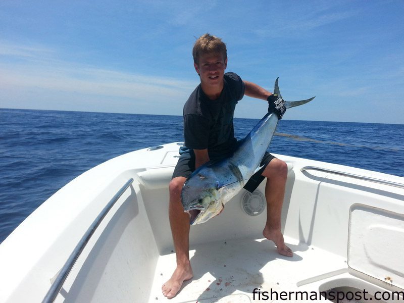 Leighton Randall with a 22 lb. dolphin he hooked on a skirted ballyhoo while trolling near the Same Ol’ Hole with his father on the “Hi-Def.”