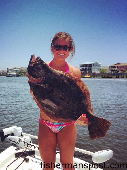 Jessica Hayes with a 10.25 lb. flounder she hooked on a live menahden while fishing inshore at Holden Beach with Cody Pyatte.