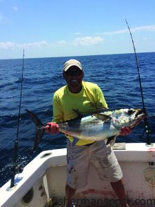 Richard Dobkin, of Sunset Beach, NC, with a 38.5 lb. blackfin tuna he hooked while trolling the Gulf Stream off Little River Inlet aboard the "Wild Bill."