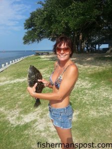 Bobbie Johnson with an 18.5" flounder that bit a green Gulp bait in Colington Harbour. Photo courtesy of TW's Tackle.