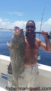 John Kraus, of Wilmington, with an 18 lb. gag grouper that bit a live bait near some bottom structure off Wrightsville Beach while he was fishing with Capt. Dave Gardner on the headboat "Vonda Kay."