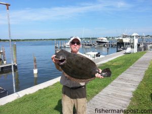 LeRoy Keeton, of Greensboro, NC, with a 10.29 lb., 29" flounder that bit a live finger mullet near Swansboro.