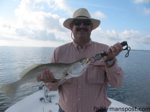 Scott Washburn, of Pfafftown, NC, with a 26" speckled trout that attacked a D.O.A. soft plastic along a lower Neuse River shoreline. He was fishing with Capt. Gary Dubiel of Spec Fever Guide Service.